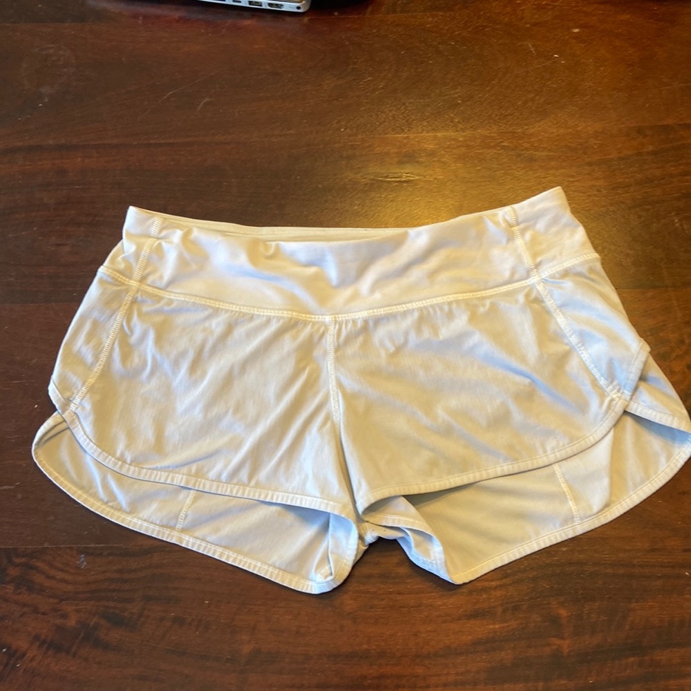 Used white Lululemon workout shorts.  Size 6